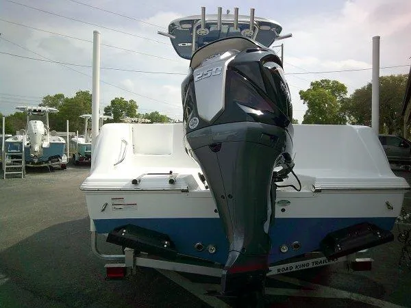 Slide: The Image of 2023 Sportsman 232 Open boat with powerful outboard motor on a trailer. - 5