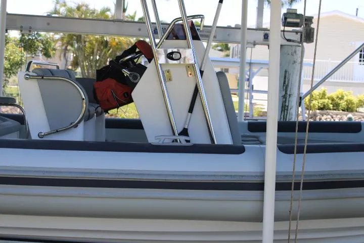Slide: The Image of 2021 Ballistic RIB boat interior with seating and console. - 18