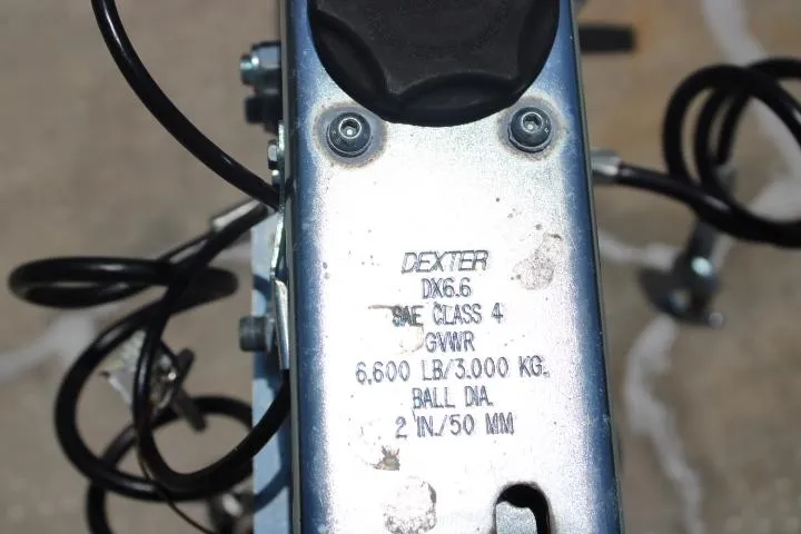 Slide: The Image of Close-up of Dexter DX6.6 trailer hitch on 2021 Ballistic RIB. - 29