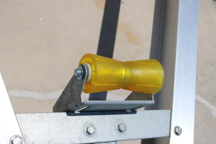 Slide: The Image of Yellow roller on a 2021 Ballistic RIB boat trailer. - 33