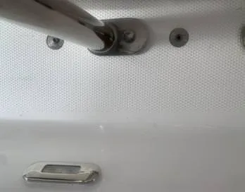 Slide: The Image of Close-up of a 2021 Ballistic RIB boat's interior, showing stainless steel fittings. - 36