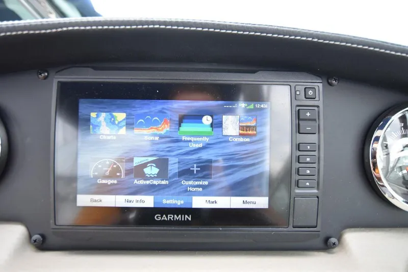 Slide: The Image of Garmin navigation system on 2021 Crownline 264 CR boat dashboard. - 28