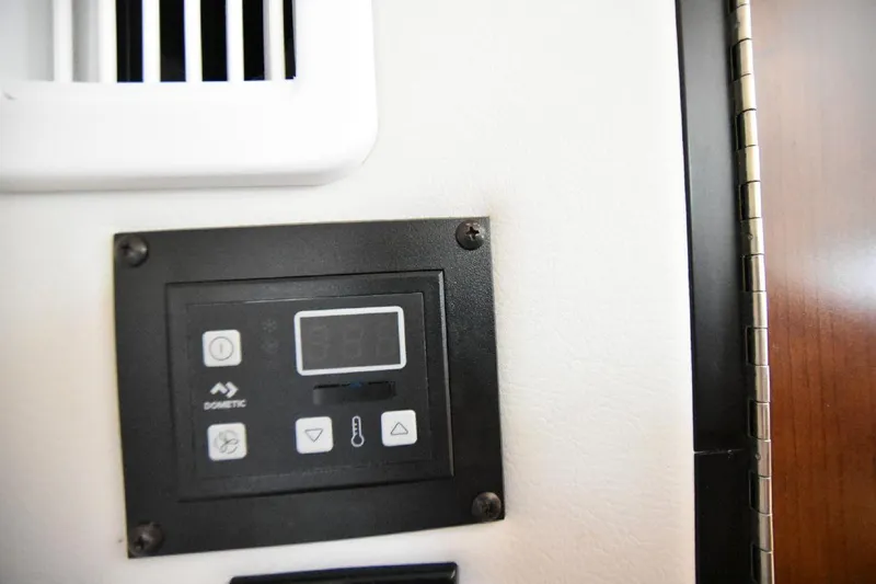 Slide: The Image of Control panel of a 2021 Crownline 264 CR boat. - 30