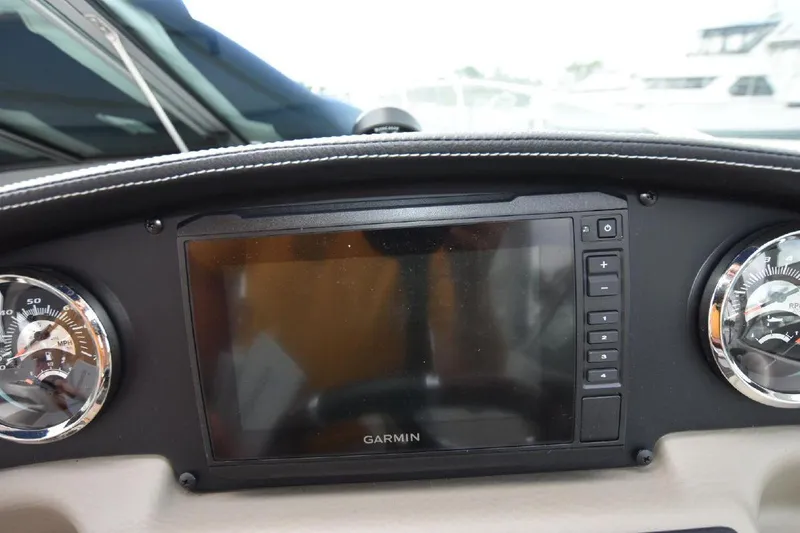 Slide: The Image of Garmin navigation system on 2021 Crownline 264 CR boat dashboard. - 40