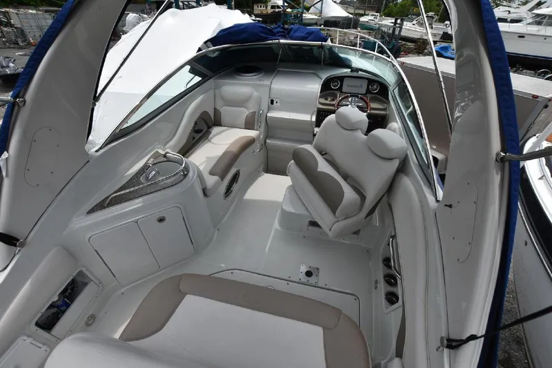 Slide: The Image of 2021 Crownline 264 CR boat interior with seating and dashboard. - 9