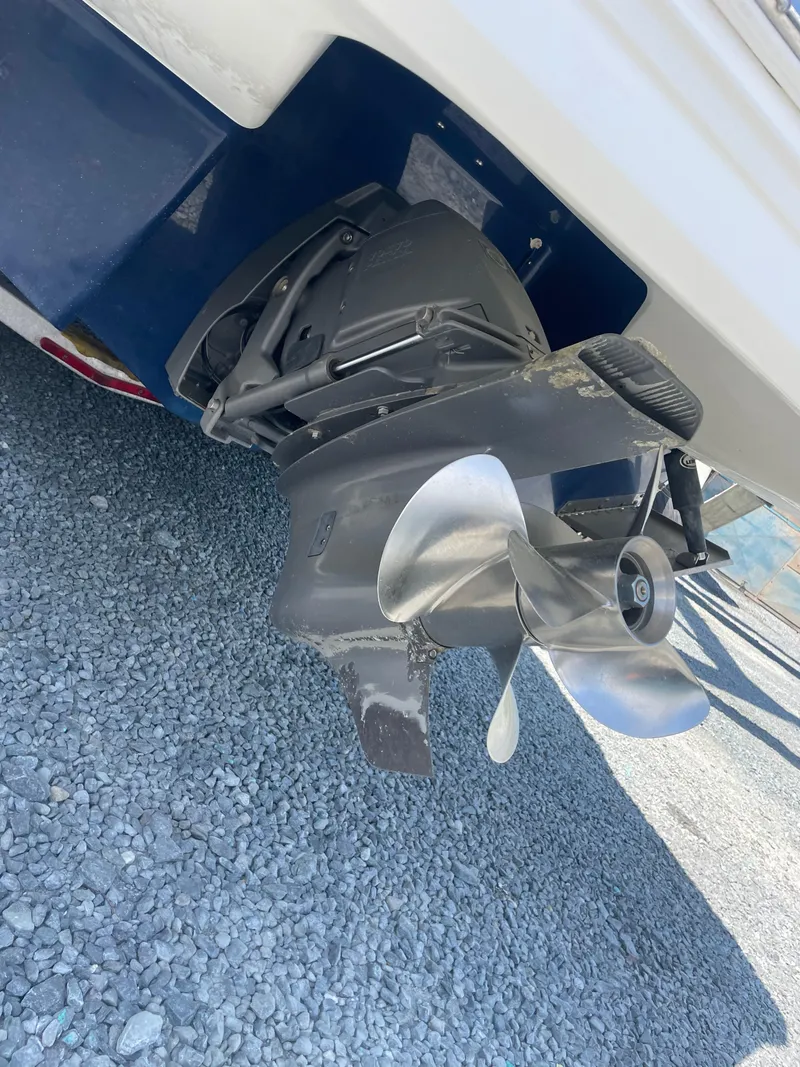 Slide: The Image of Propeller of a 2012 Chaparral 284 Sunesta boat on gravel. - 10