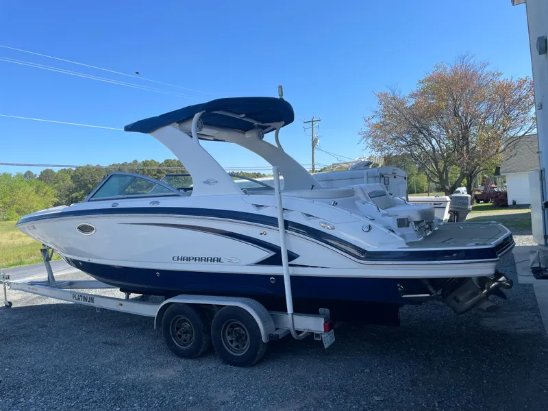 Slide: The Image of 2012 Chaparral 284 Sunesta boat on trailer outdoors. - 3