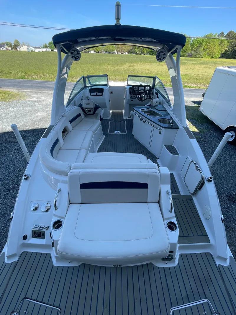 Slide: The Image of Interior view of a 2012 Chaparral 284 Sunesta boat with seating area. - 5
