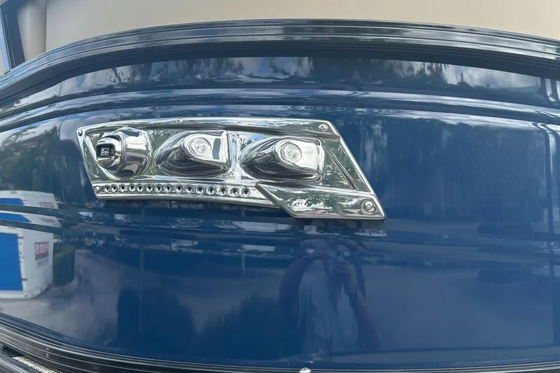 Slide: The Image of Close-up of 2023 Regency 250 LE3 boat's chrome light fixture. - 15