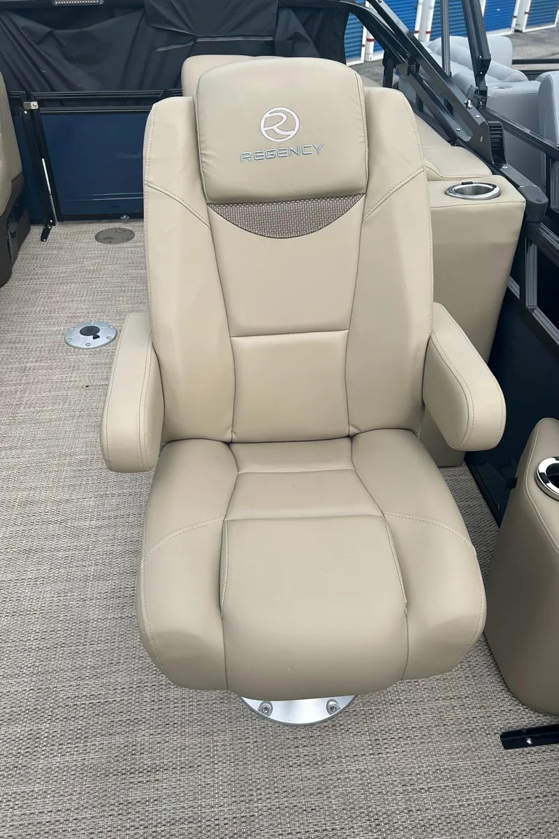 Slide: The Image of 2023 Regency 250 LE3 captain's chair in beige leather. - 8