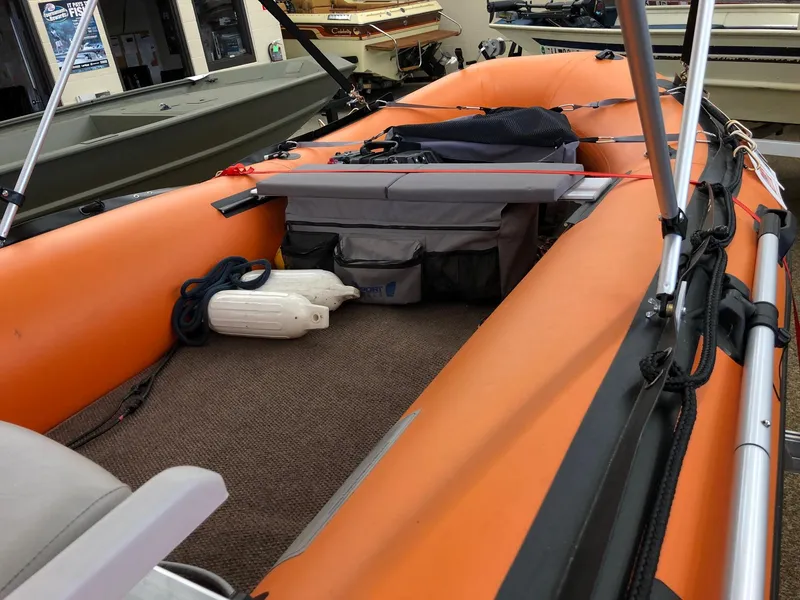 Slide: The Image of Sea Eagle 14' Inflatable boat, 2015 model, orange with interior gear and accessories. - 10