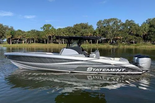 Slide: The Image of 2026 Statement 35 CC Open boat on calm water, featuring sleek design and modern features. - 6