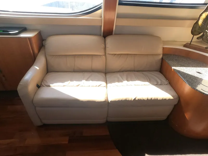 Slide: The Image of Beige leather sofa in the interior of a 2003 Meridian 341 Sedan yacht. - 18