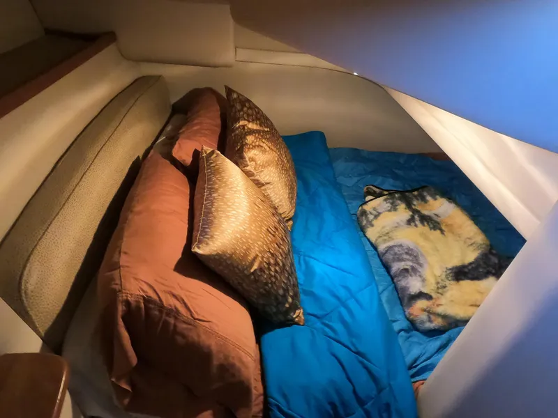 Slide: The Image of Cozy sleeping quarters in a 2003 Meridian 341 Sedan yacht. - 21