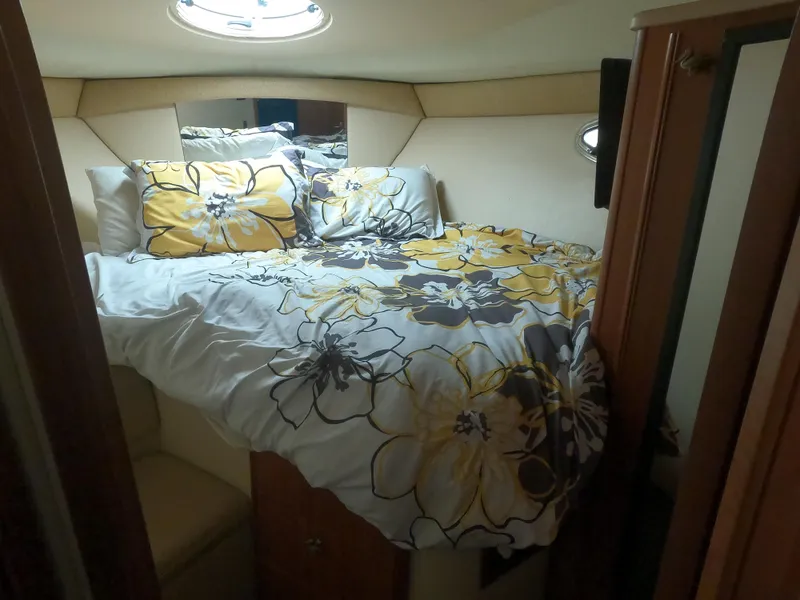 Slide: The Image of Cozy bedroom in 2003 Meridian 341 Sedan yacht with floral bedding. - 23