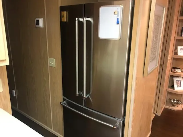Slide: The Image of Stainless steel refrigerator in 1997 Stardust Cruisers houseboat kitchen interior. - 11