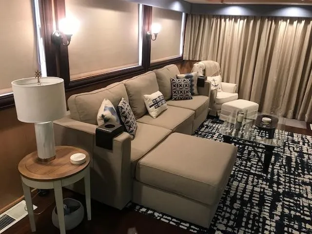 Slide: The Image of Luxurious 1997 Stardust Cruisers houseboat interior with cozy seating and modern decor. - 6