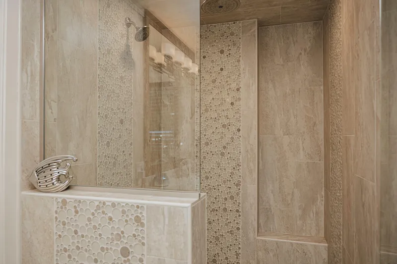 Slide: The Image of Luxurious shower with textured tiles in a 1996 Sumerset houseboat. - 16