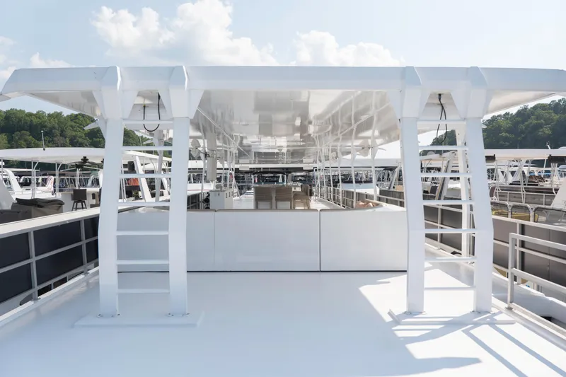 Slide: The Image of 1996 Sumerset Houseboat 20' x 104' with spacious upper deck and modern design. - 22