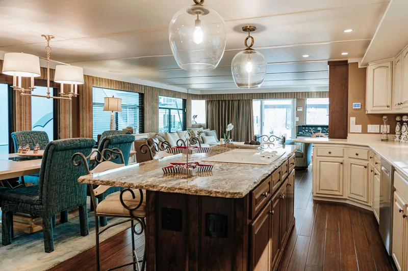 Slide: The Image of Luxurious 1996 Sumerset houseboat interior with elegant kitchen and dining area. - 5
