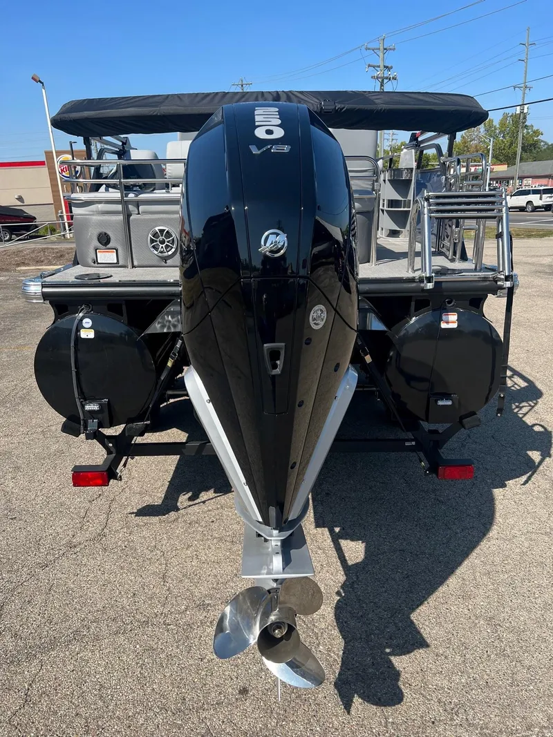 Slide: The Image of 2023 Regency 230 LE3 Sport boat with powerful V8 engine, rear view. - 6