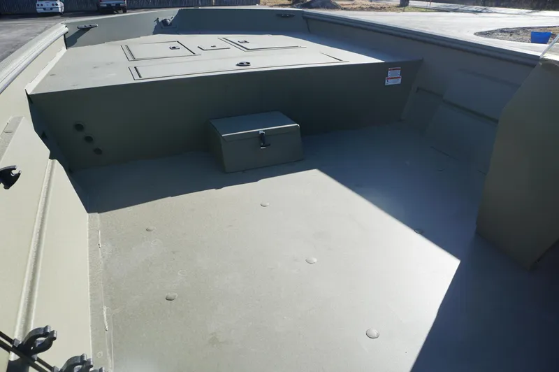 Slide: The Image of 2023 Lowe RX2070 SC boat interior with storage compartments. - 7