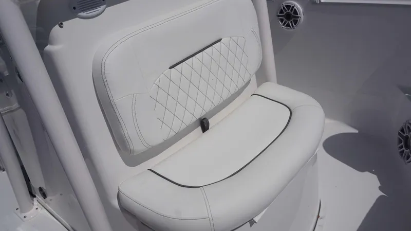 Slide: The Image of 2023 Sportsman 231 Heritage boat seat with white upholstery and diamond stitching. - 15