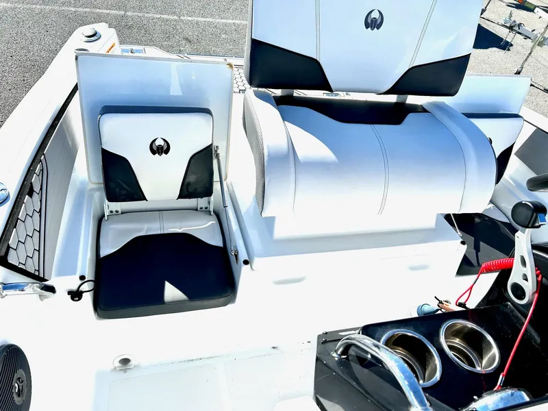 Slide: The Image of 2020 Scarab 195 Open ID boat interior with sleek seating and cup holders. - 18