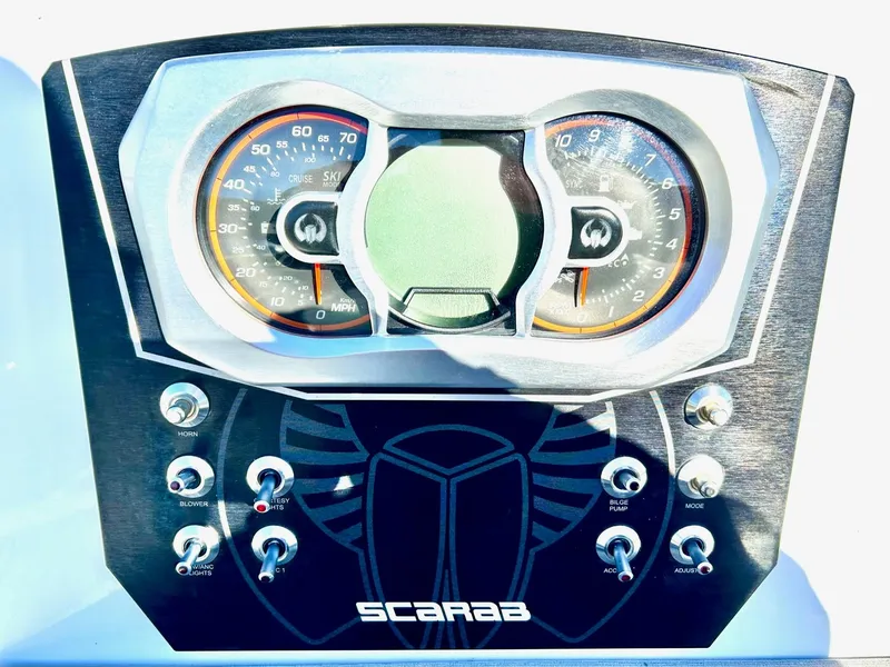 Slide: The Image of Dashboard of 2020 Scarab 195 Open ID boat with gauges and controls. - 22