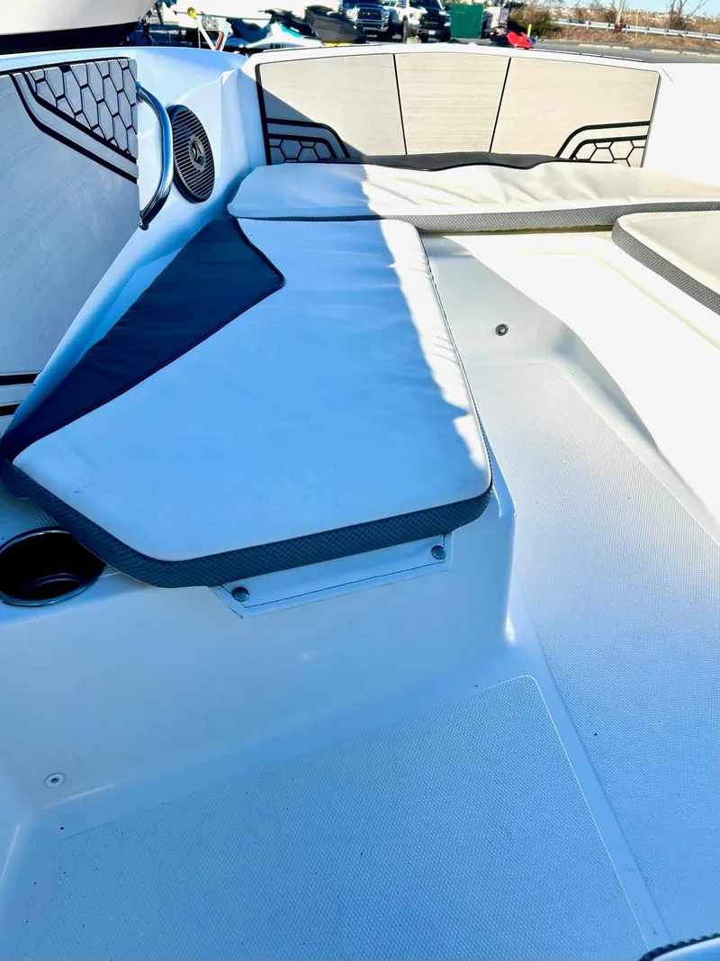 Slide: The Image of 2020 Scarab 195 Open ID boat interior with cushioned seating and modern design. - 29