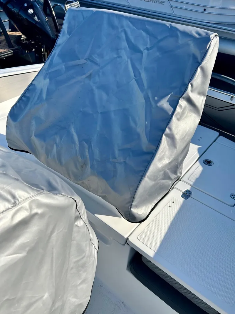 Slide: The Image of 2020 Scarab 195 Open ID boat with protective seat covers. - 33