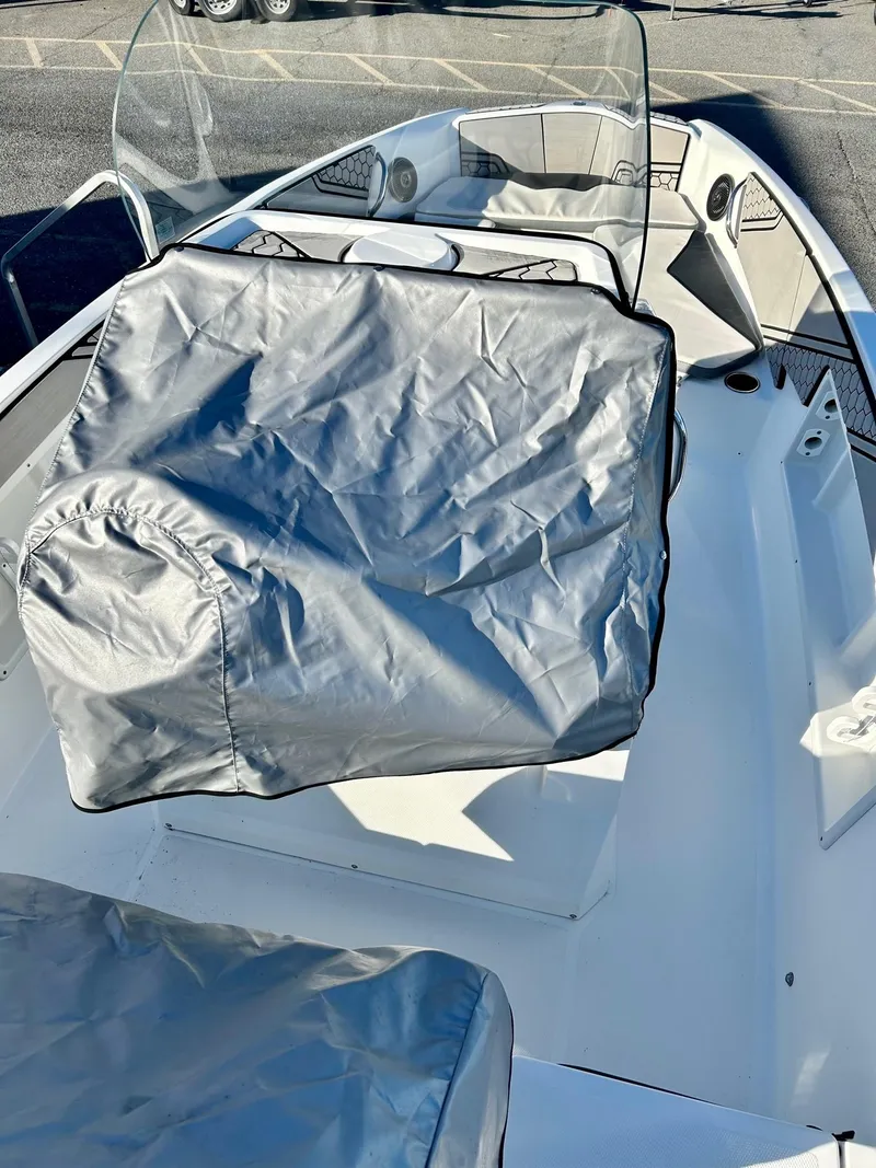 Slide: The Image of 2020 Scarab 195 Open ID boat interior with protective covers. - 35