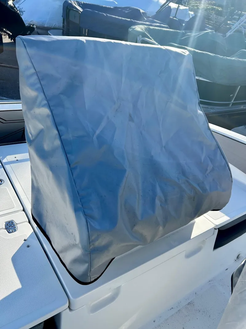 Slide: The Image of 2020 Scarab 195 Open ID boat with covered console, outdoor setting. - 36