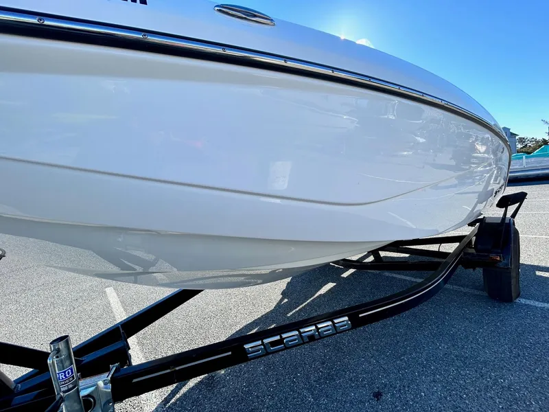 Slide: The Image of 2020 Scarab 195 Open ID boat on a trailer, close-up view. - 4
