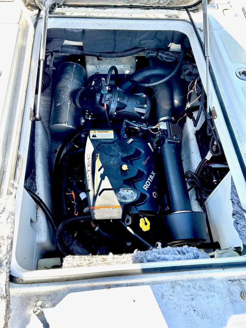 Slide: The Image of 2020 Scarab 195 Open ID engine compartment with Rotax engine. - 40