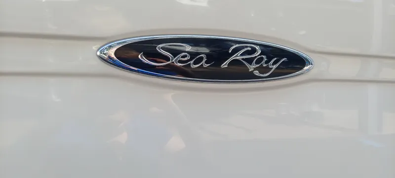 Slide: The Image of 2012 Sea Ray 240 Sundancer logo on boat exterior - 3