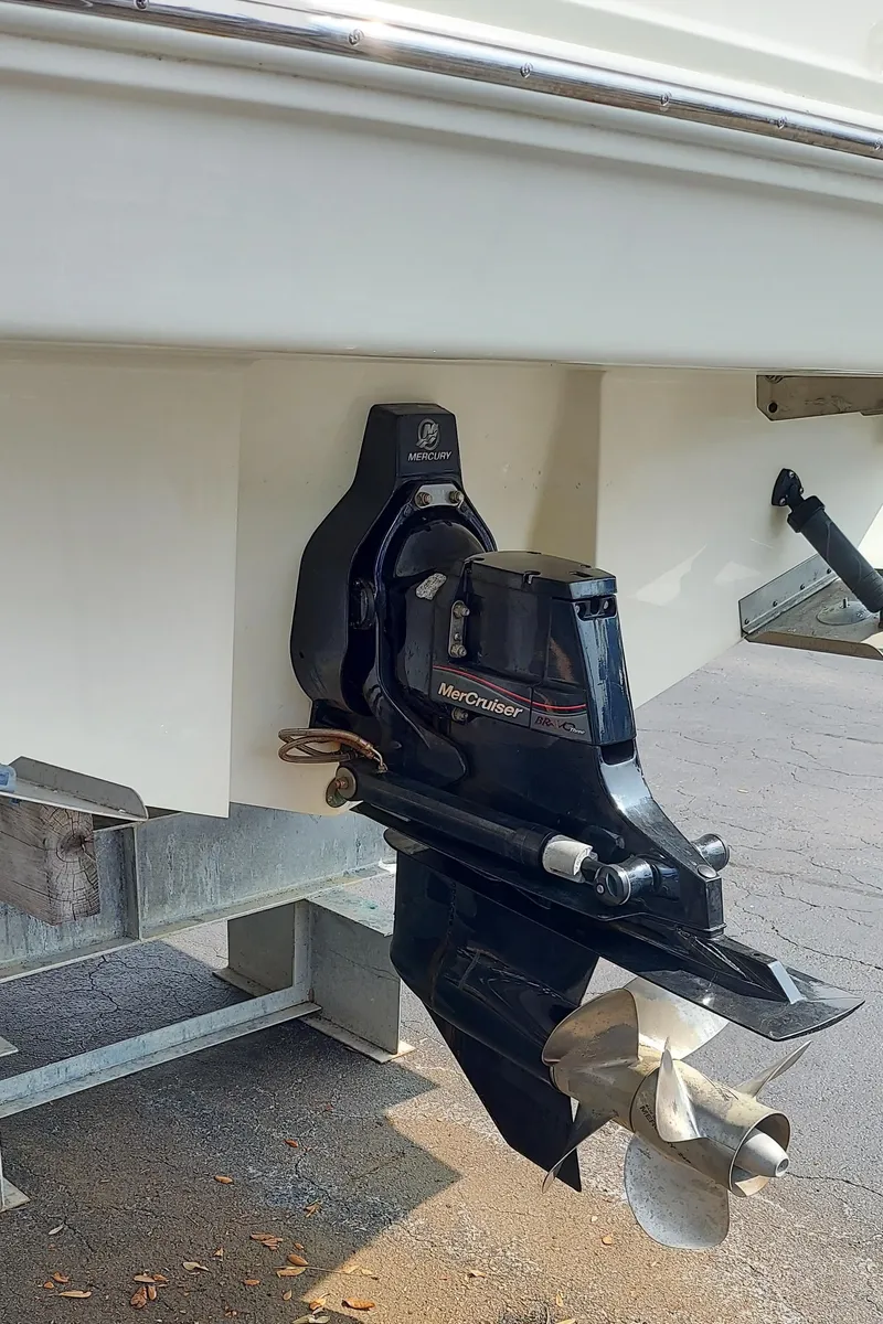 Slide: The Image of 2012 Sea Ray 240 Sundancer boat with MerCruiser outdrive. - 8