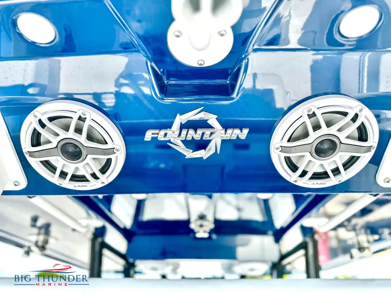 Slide: The Image of 2023 Fountain 38 CC boat with speakers, Big Thunder Marine logo. - 10