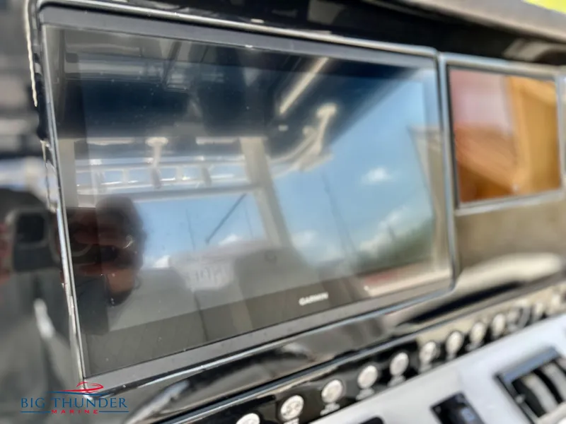 Slide: The Image of Close-up of 2023 Fountain 38 CC boat's Garmin navigation display. - 17