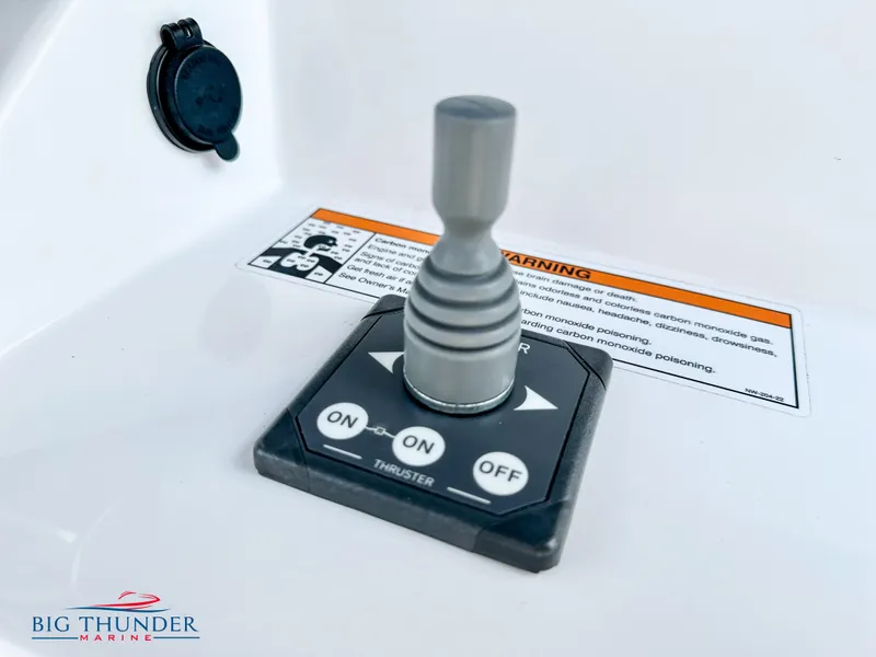 Slide: The Image of Joystick control on a 2023 Fountain 38 CC boat by Big Thunder Marine. - 22