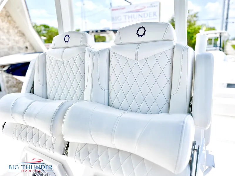 Slide: The Image of Luxury seating on 2023 Fountain 38 CC boat at Big Thunder Marine. - 28