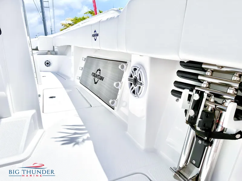 Slide: The Image of 2023 Fountain 38 CC boat interior with Big Thunder Marine logo. - 32
