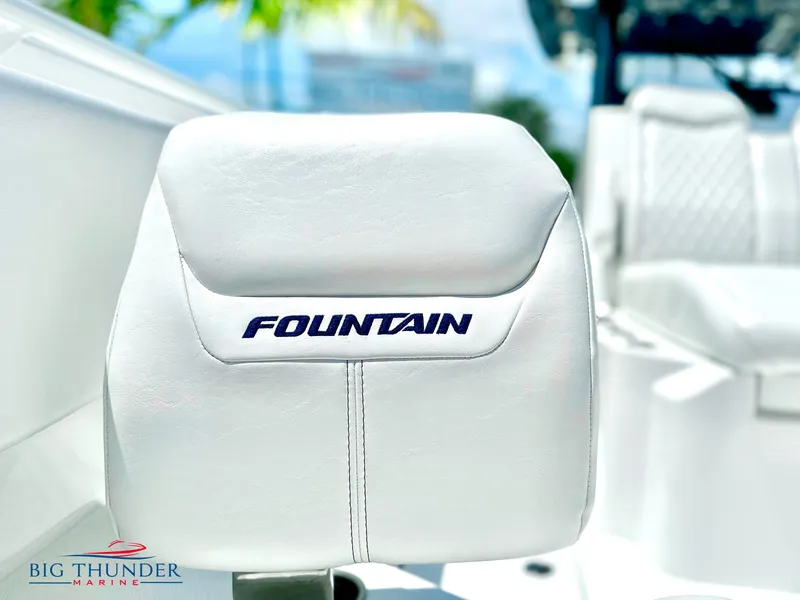 Slide: The Image of White leather seat on 2023 Fountain 38 CC boat, Big Thunder Marine logo. - 43