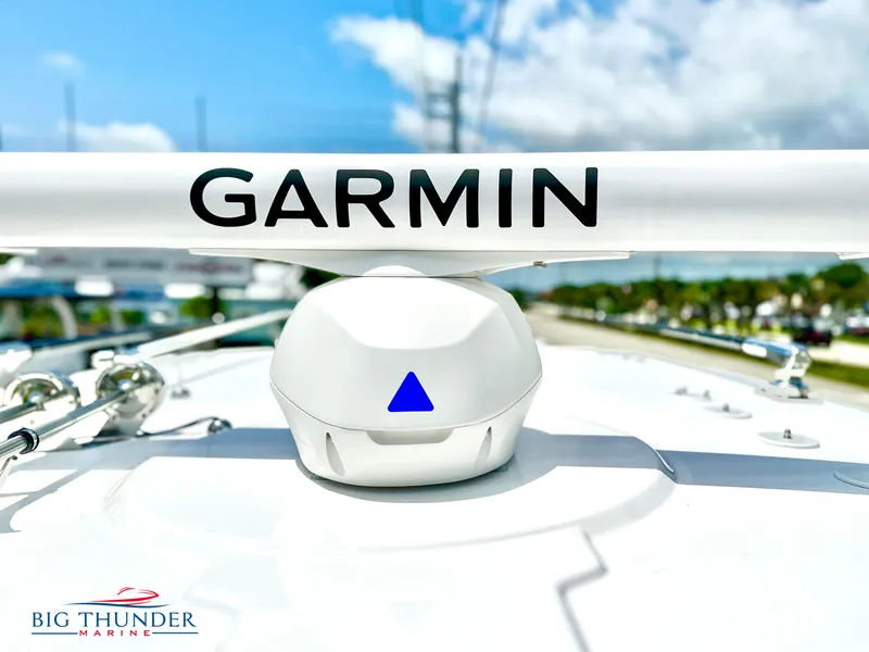 Slide: The Image of 2023 Fountain 38 CC boat with Garmin radar, Big Thunder Marine logo visible. - 47