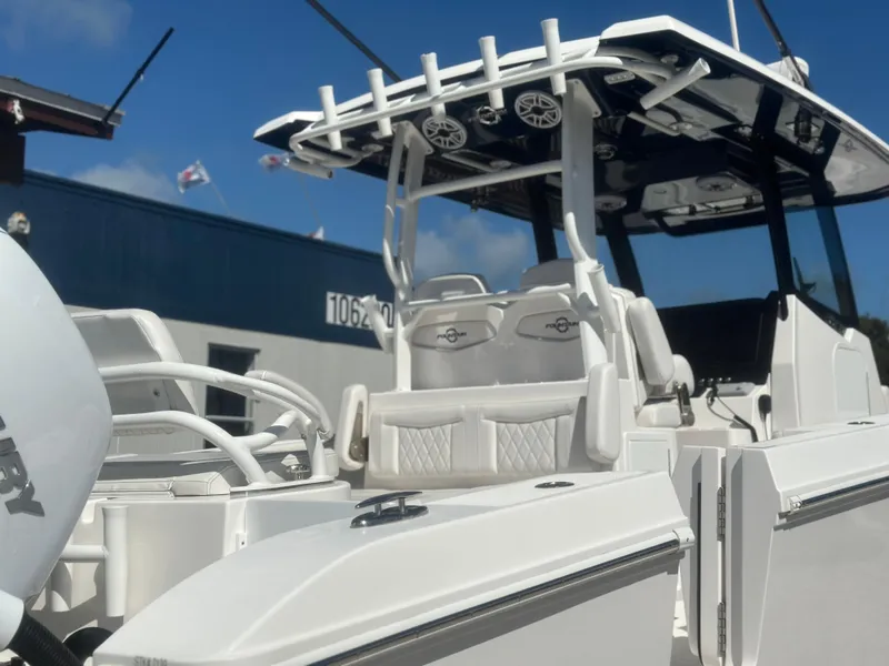 Slide: The Image of 2023 Fountain 38 CC boat with sleek design and modern features. - 7