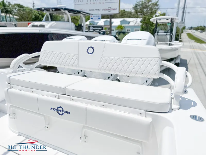 Slide: The Image of 2023 Fountain 38 CC boat with white seating at Big Thunder Marine. - 9