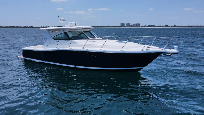 Slide: The Image of 2005 Tiara Yachts 3800 Open cruising on calm blue waters. - 1