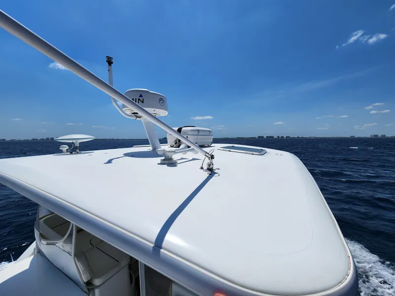 Slide: The Image of 2005 Tiara Yachts 3800 Open cruising on a sunny day. - 11