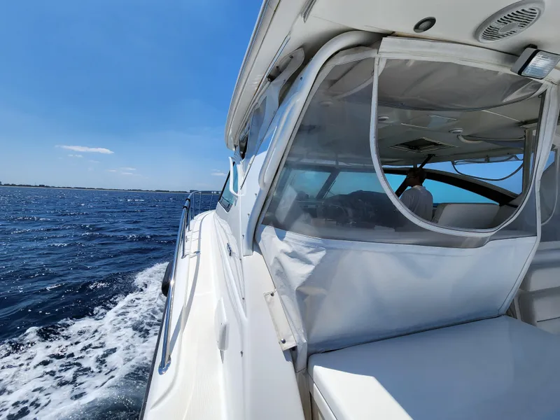 Slide: The Image of 2005 Tiara Yachts 3800 Open cruising on a sunny day. - 12