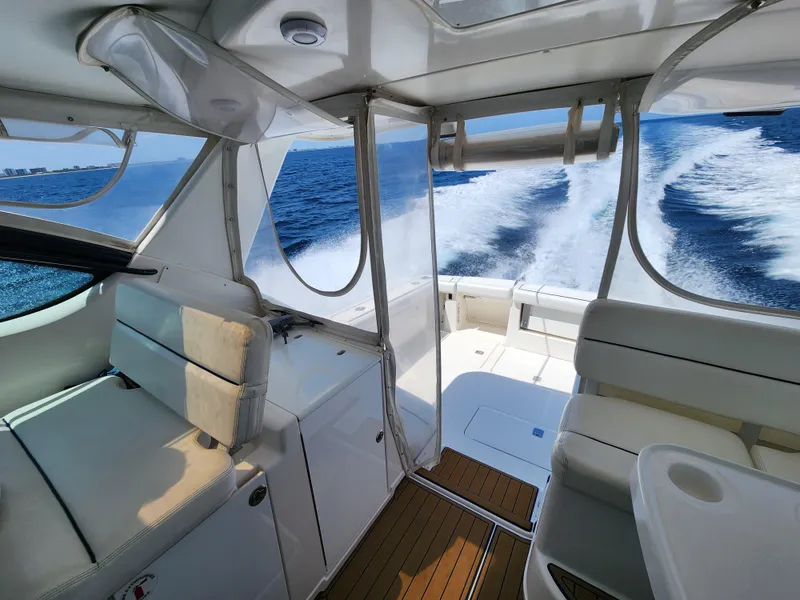 Slide: The Image of Interior view of 2005 Tiara Yachts 3800 Open cruising on the ocean. - 16